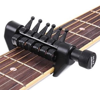 voice Mourn life Beginner's Guide to Using A Capo | National Guitar Academy