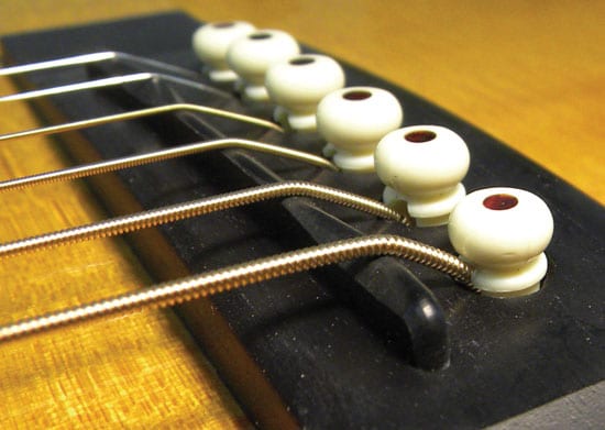 how to change guitar strings