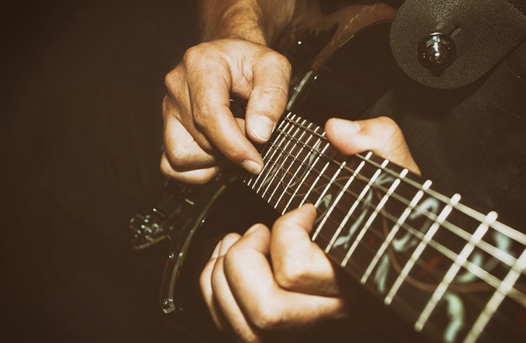 how-to-strum-a-guitar-without-a-pick